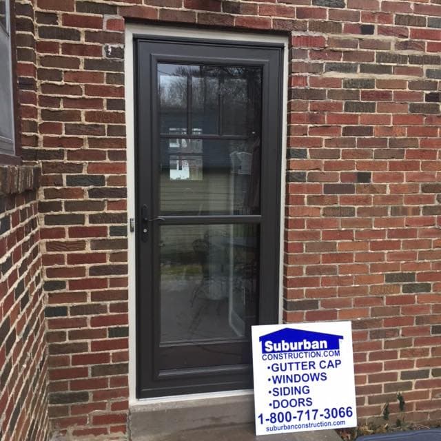 Modern storm door with sleek frame and double glass panels