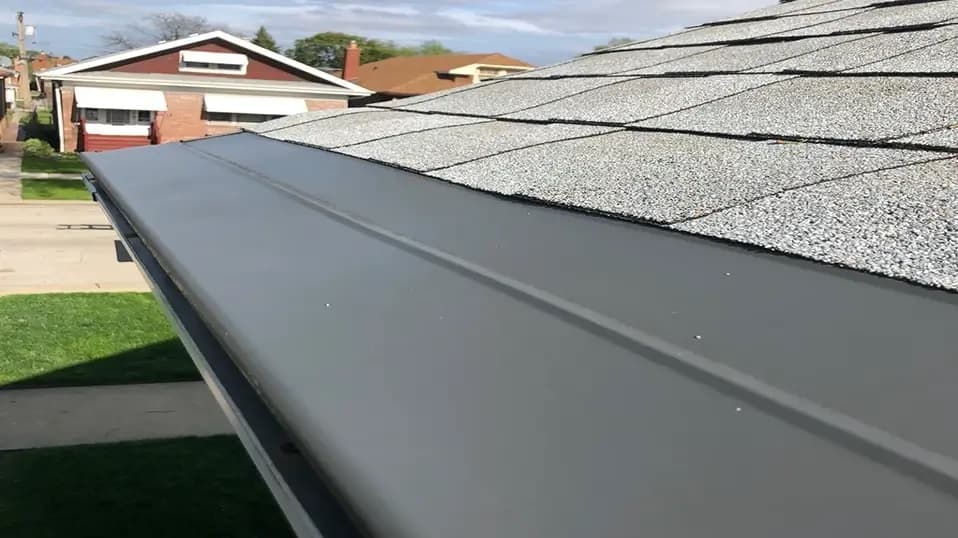 Gutter Cap system installed on home keeping debris out