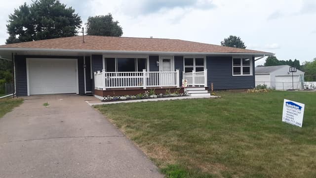 Vinyl siding installation in progress in Iowa